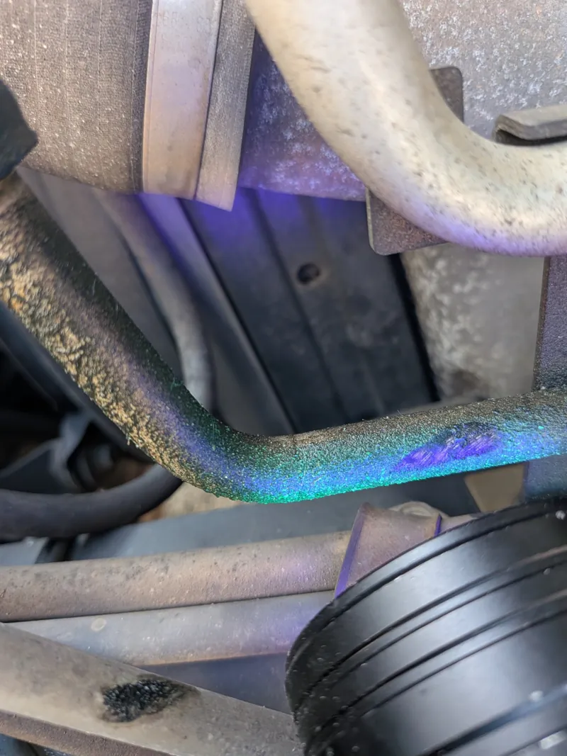 UV dye under a black light pinpoints an AC leak before we replace anything