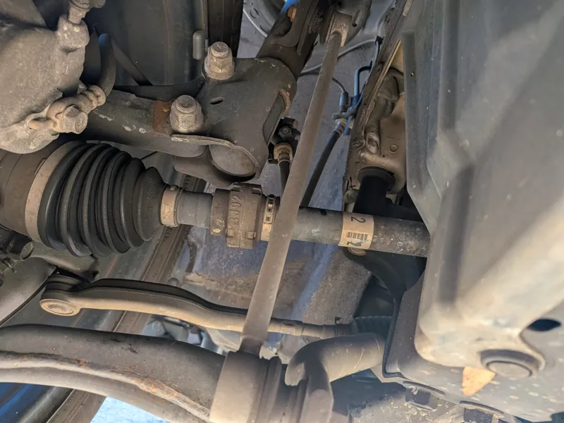 Checking a front axle, tie rod and suspension on-site