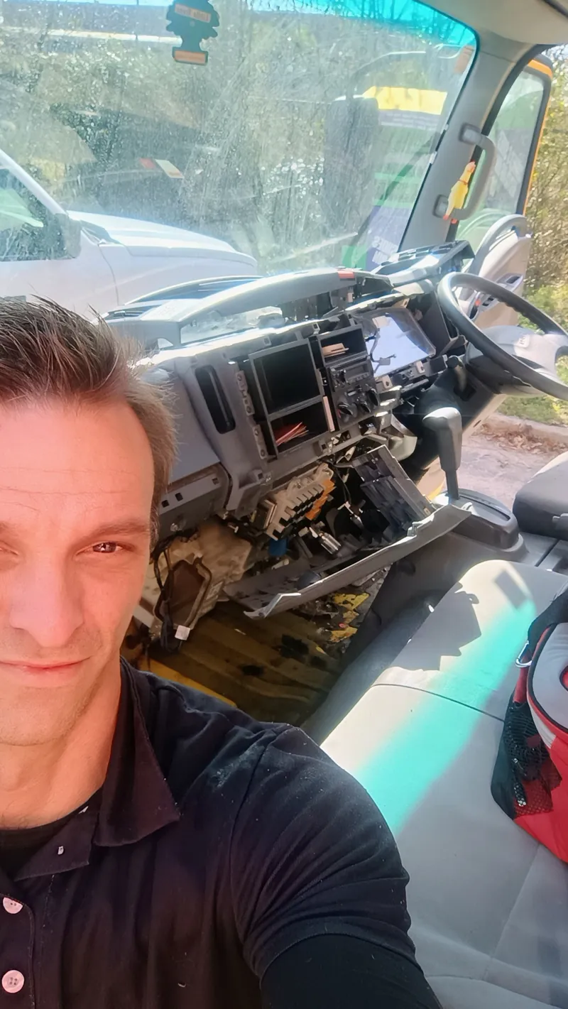Full dash teardown on a commercial truck, done in the customer's lot