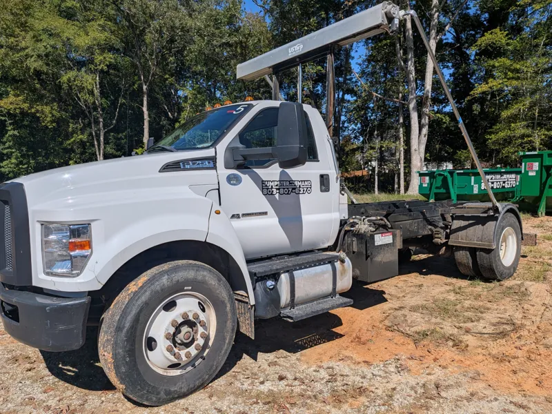 Ford F-750 roll-off truck kept on the road with on-site service