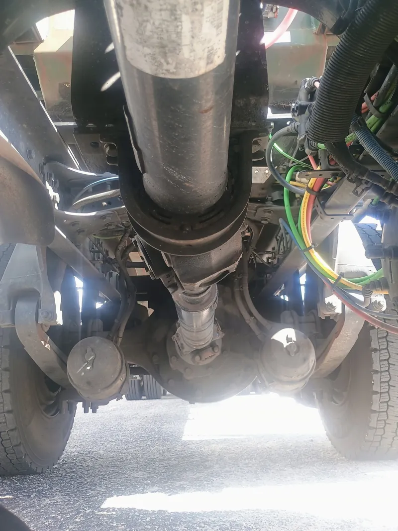 Driveline and air brake inspection under a medium-duty truck