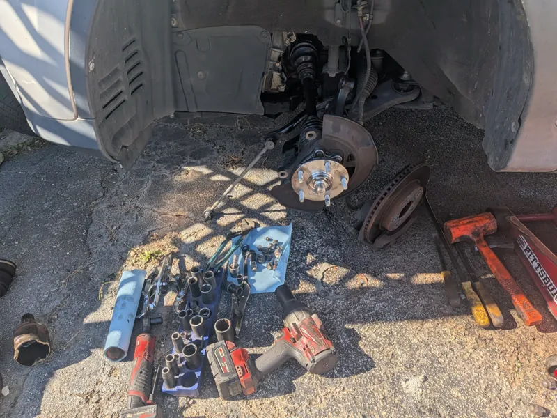 New hub bearing in, tools laid out on site