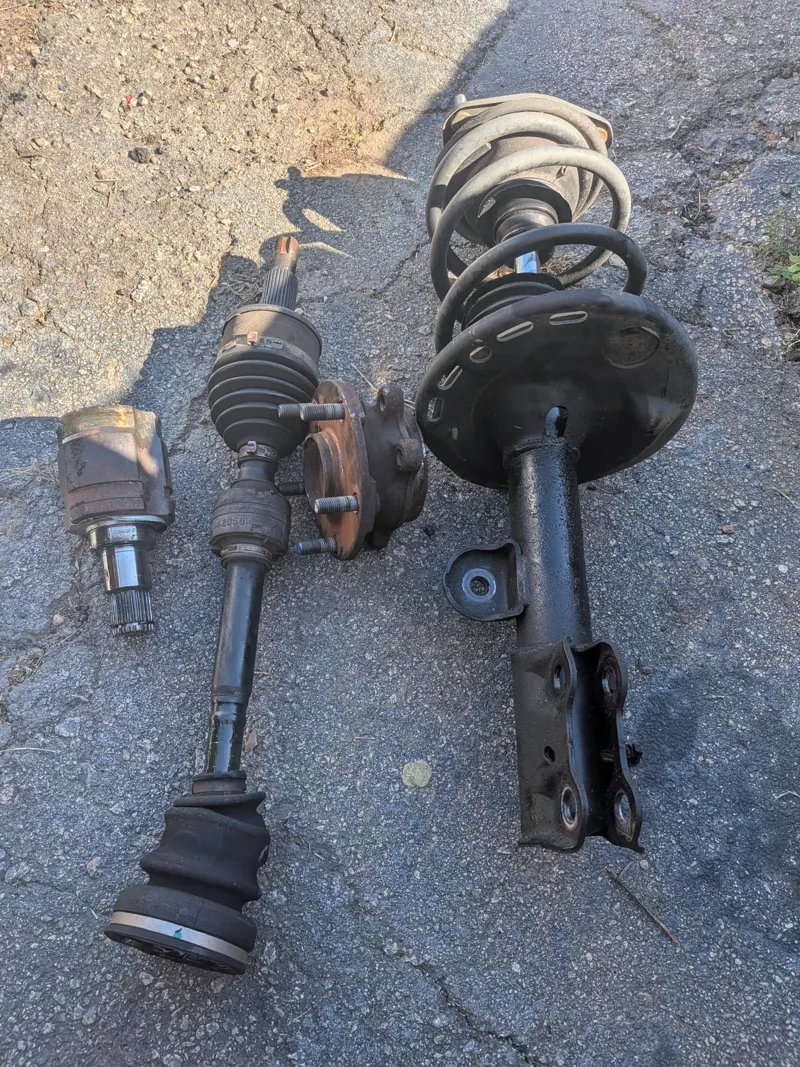 The old axle, hub bearing and strut that came off that RAV4